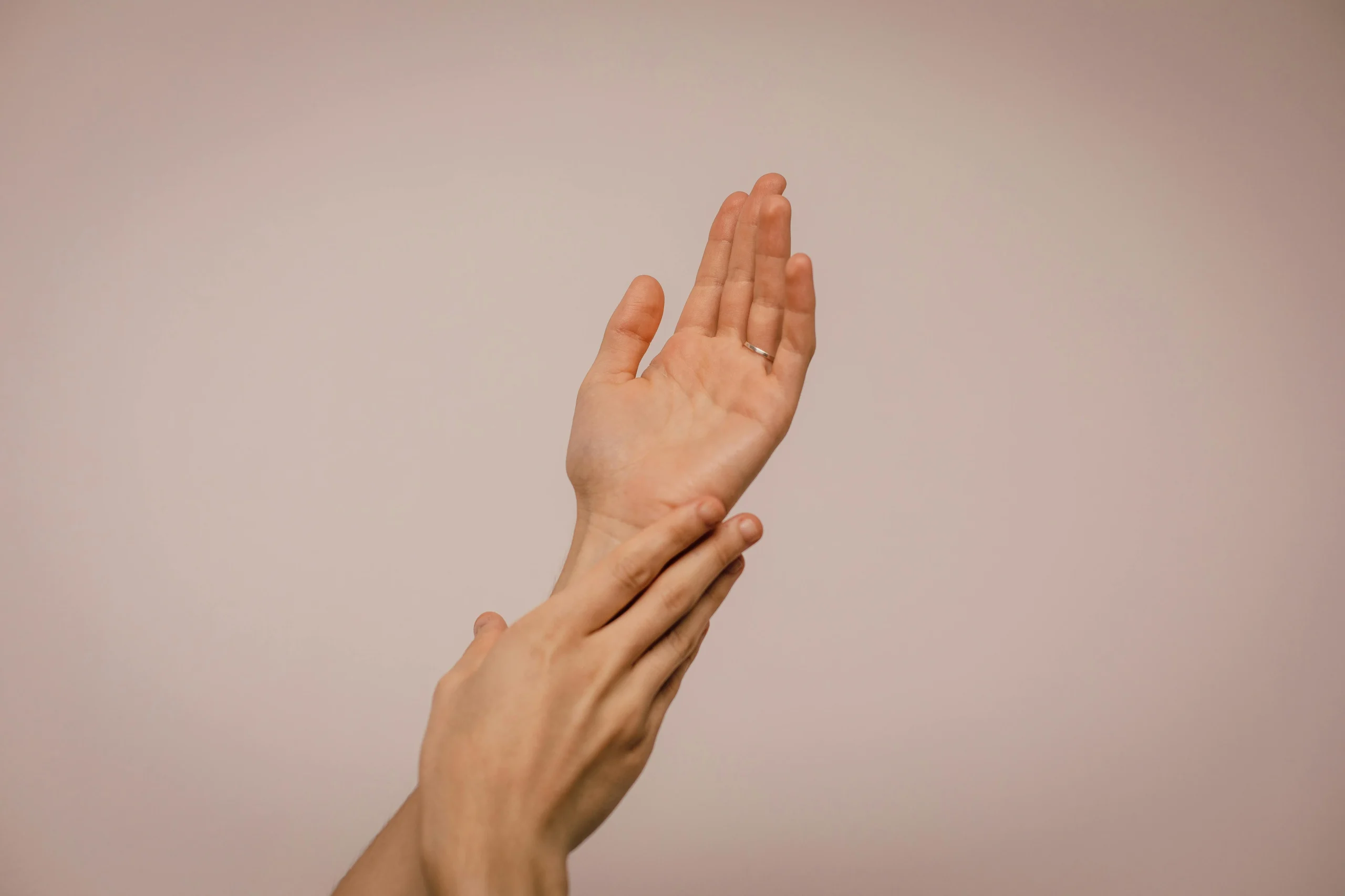 The Benefits of Minimalism for Mental Health and Well-Bein Gentle hand movement symbolizing mindfulness and emotional awareness